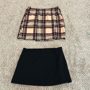 These are two skirts from SHEIN. The plaid skirt has a slit in the corner.